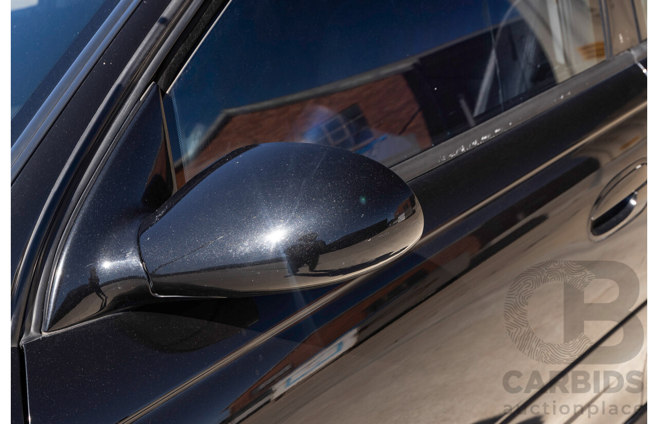 2/2002 Holden Commodore SS VXII 4d Sedan Phantom Black Metallic V8 5.7L