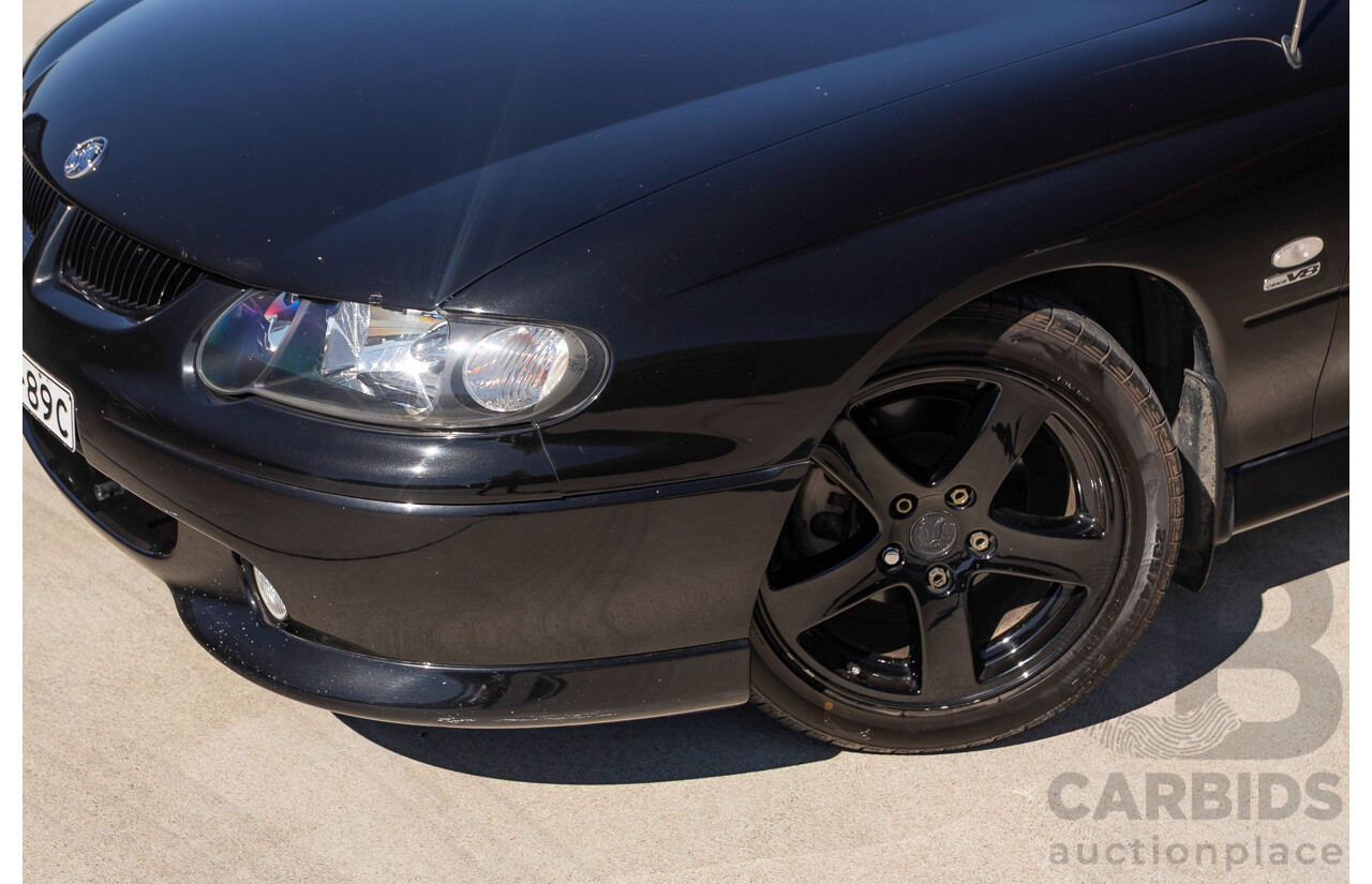 2/2002 Holden Commodore SS VXII 4d Sedan Phantom Black Metallic V8 5.7L