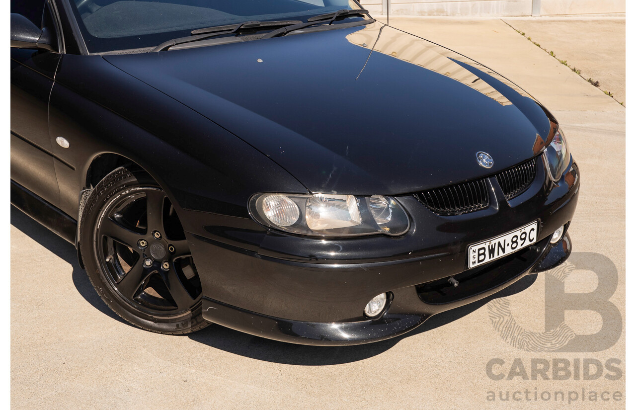 2/2002 Holden Commodore SS VXII 4d Sedan Phantom Black Metallic V8 5.7L