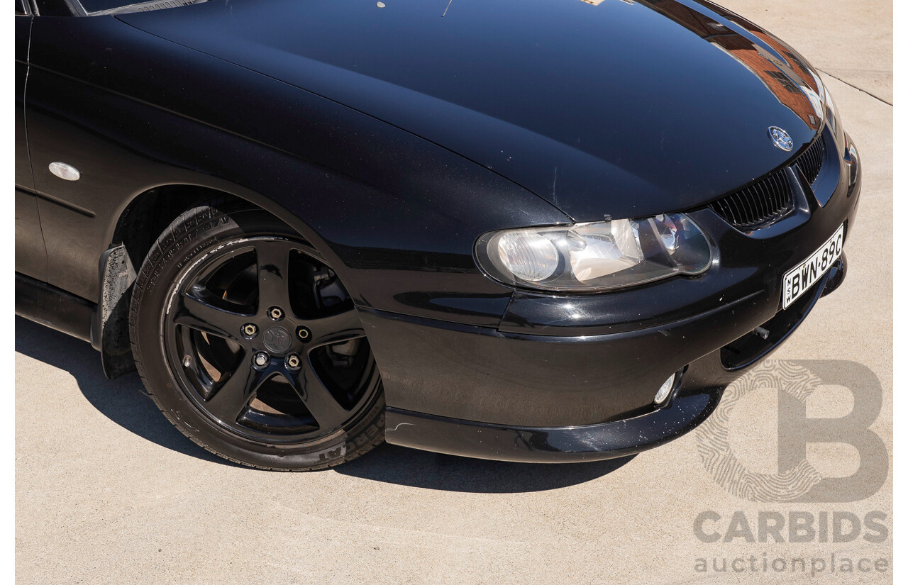 2/2002 Holden Commodore SS VXII 4d Sedan Phantom Black Metallic V8 5.7L