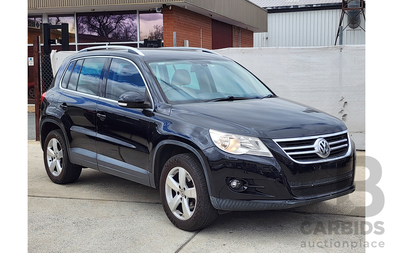 10/2010 Volkswagen Tiguan 147 TSI 5NC MY10 4d Wagon Black 2.0L