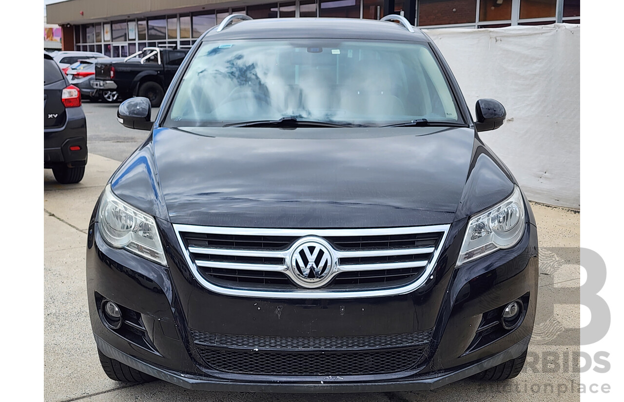 10/2010 Volkswagen Tiguan 147 TSI 5NC MY10 4d Wagon Black 2.0L