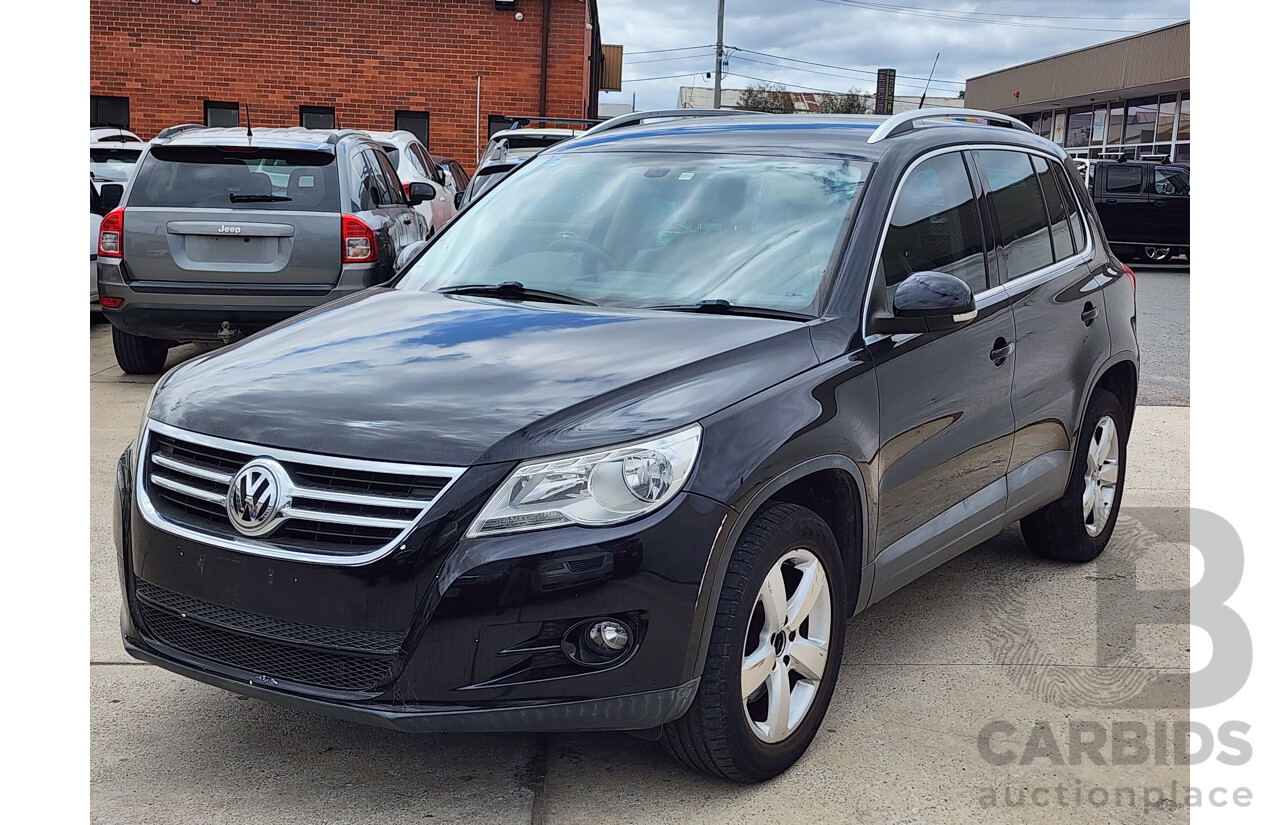 10/2010 Volkswagen Tiguan 147 TSI 5NC MY10 4d Wagon Black 2.0L