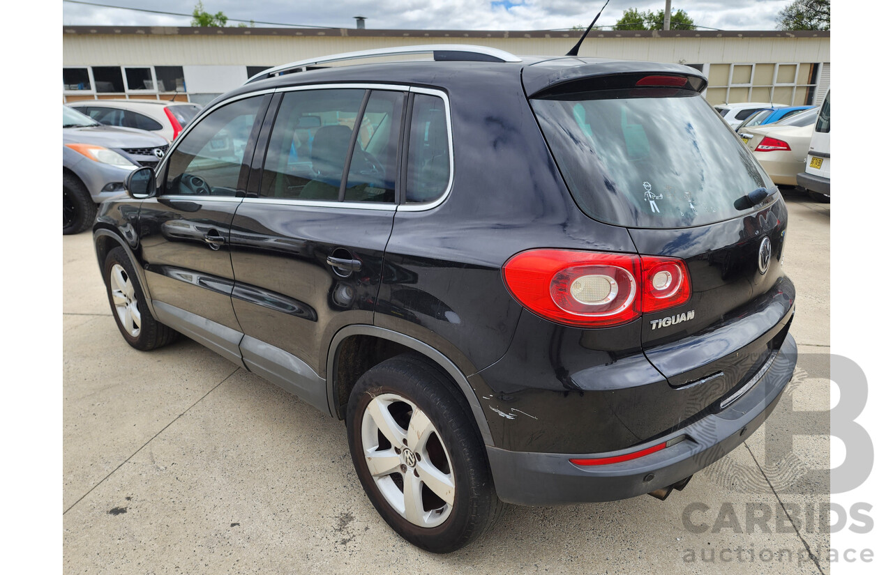 10/2010 Volkswagen Tiguan 147 TSI 5NC MY10 4d Wagon Black 2.0L