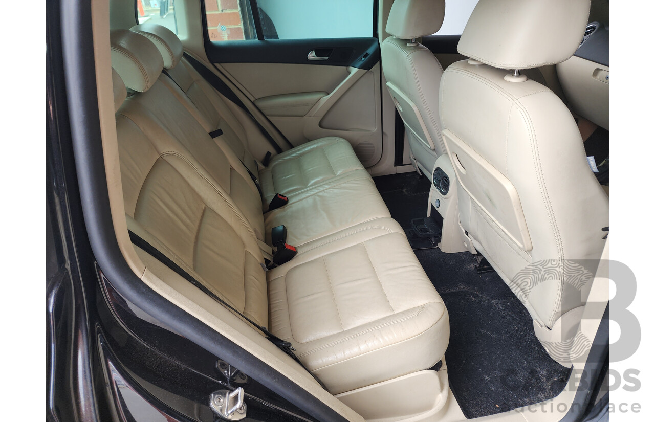 10/2010 Volkswagen Tiguan 147 TSI 5NC MY10 4d Wagon Black 2.0L