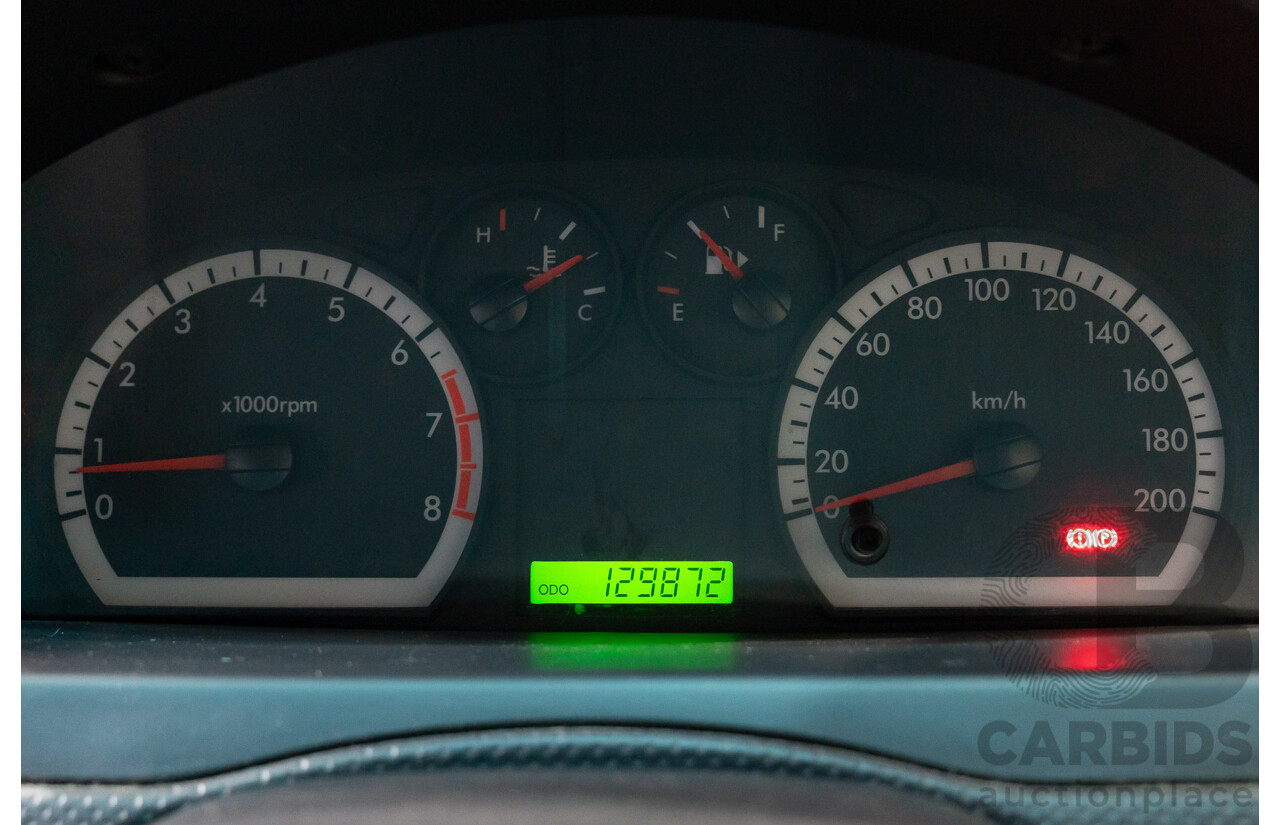 01/2011 Holden Barina TK MY11 5d Hatchback White 1.6L
