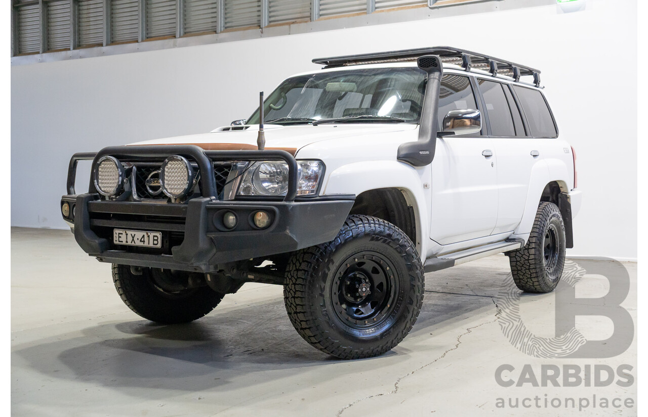 10/2015 Nissan Patrol ST (4x4) GU Series 9 4d Wagon White Turbo Diesel 3.0L