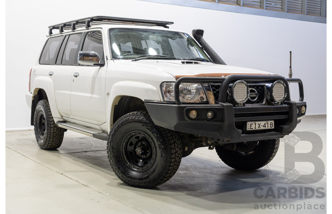 10/2015 Nissan Patrol ST (4x4) GU Series 9 4d Wagon White Turbo Diesel 3.0L
