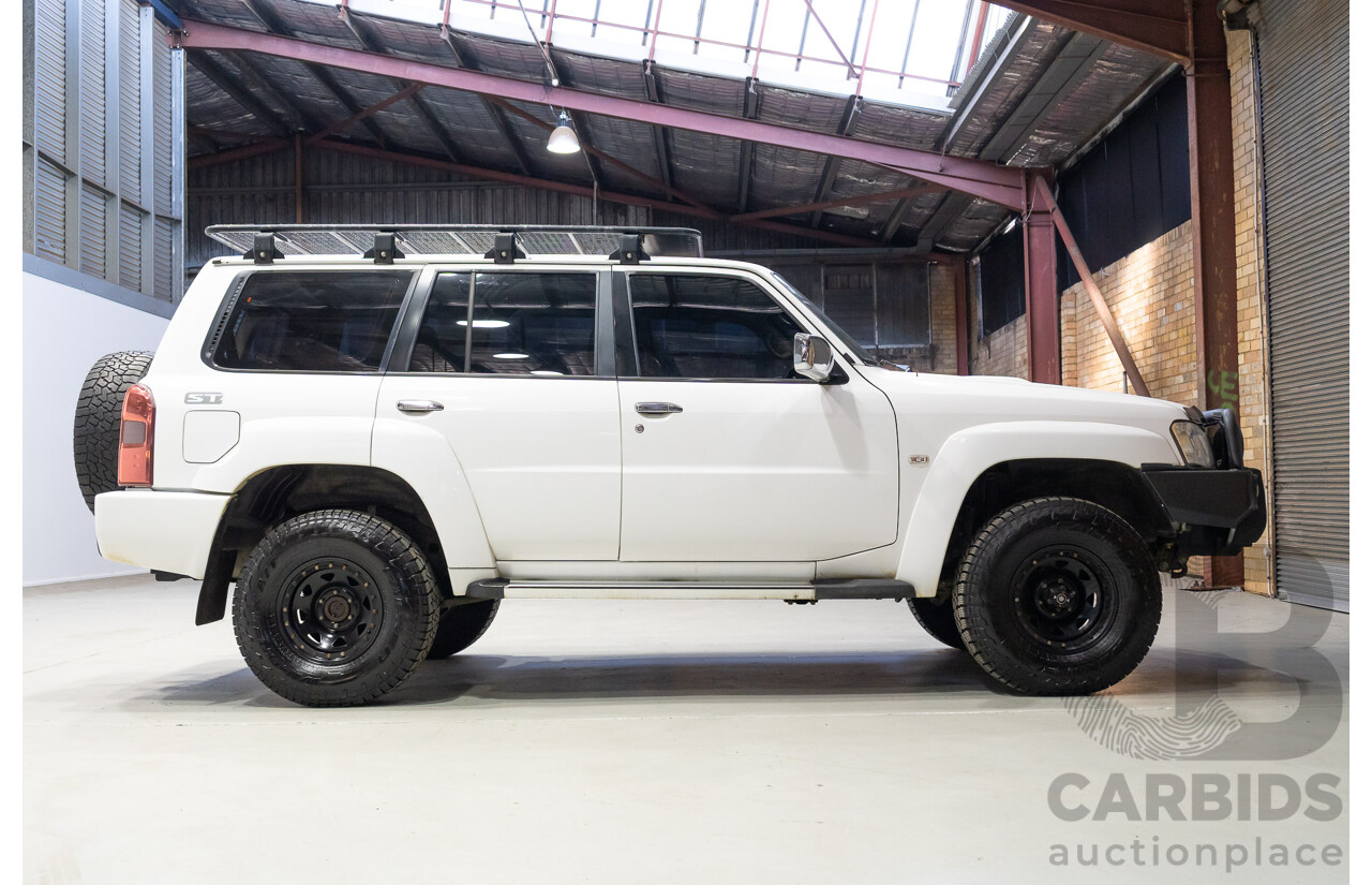 10/2015 Nissan Patrol ST (4x4) GU Series 9 4d Wagon White Turbo Diesel 3.0L