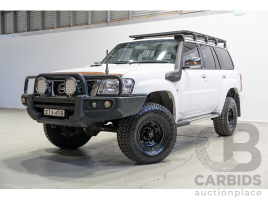 10/2015 Nissan Patrol ST (4x4) GU Series 9 4d Wagon White Turbo Diesel 3.0L