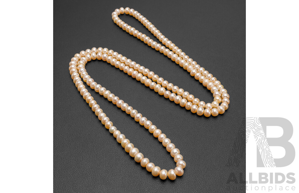 Long Strand Pink/Peach Freshwater Pearl Necklace. Length - 114cms