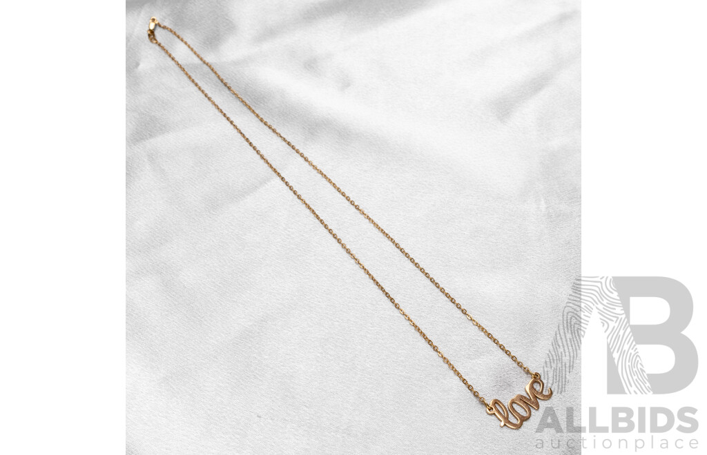 9ct Yellow Gold "Love" Necklace. Length - 48.5cms - 3.11gms