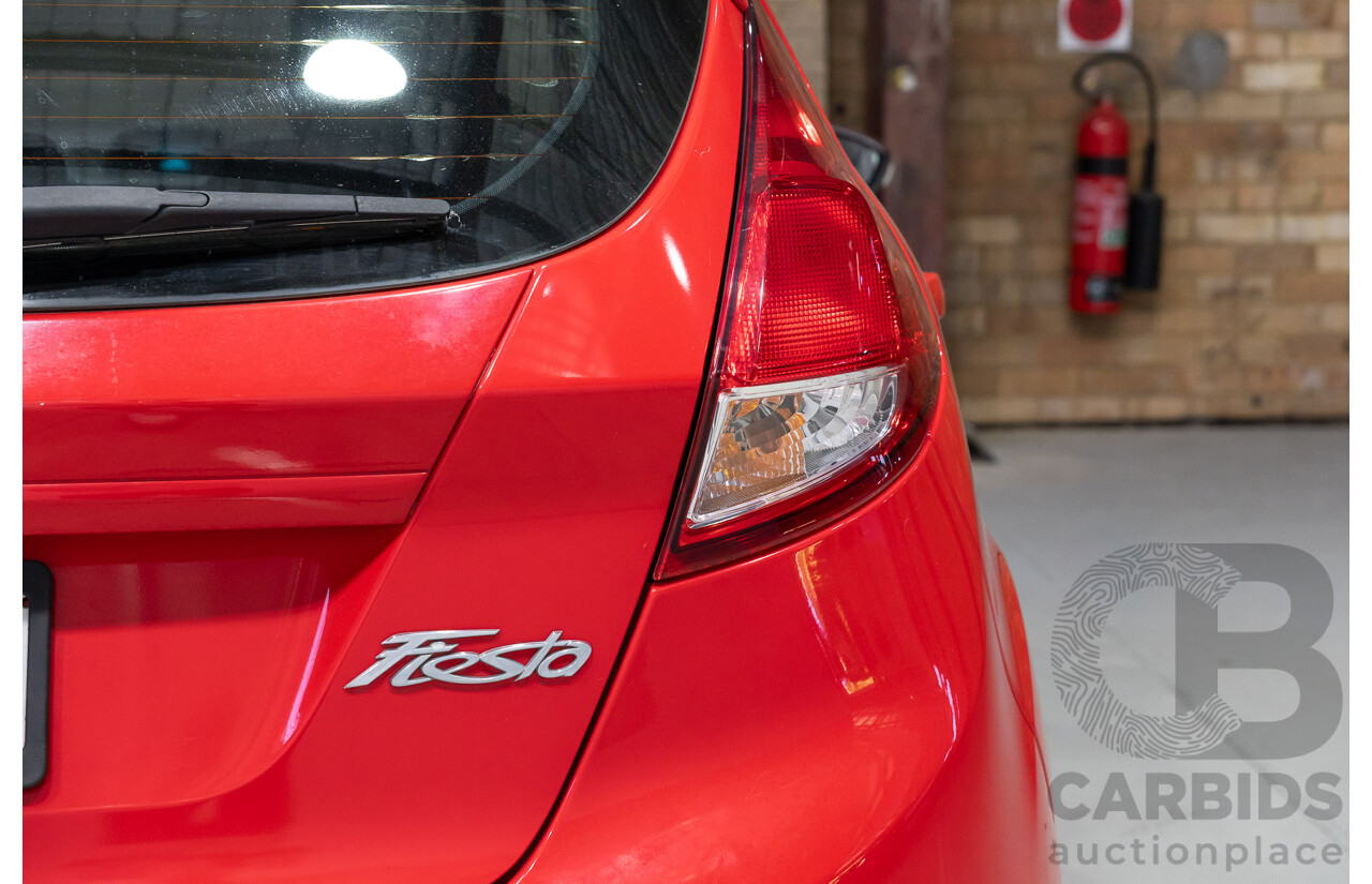 09/2013 Ford Fiesta LX WT 5d Hatchback Red 1.6L