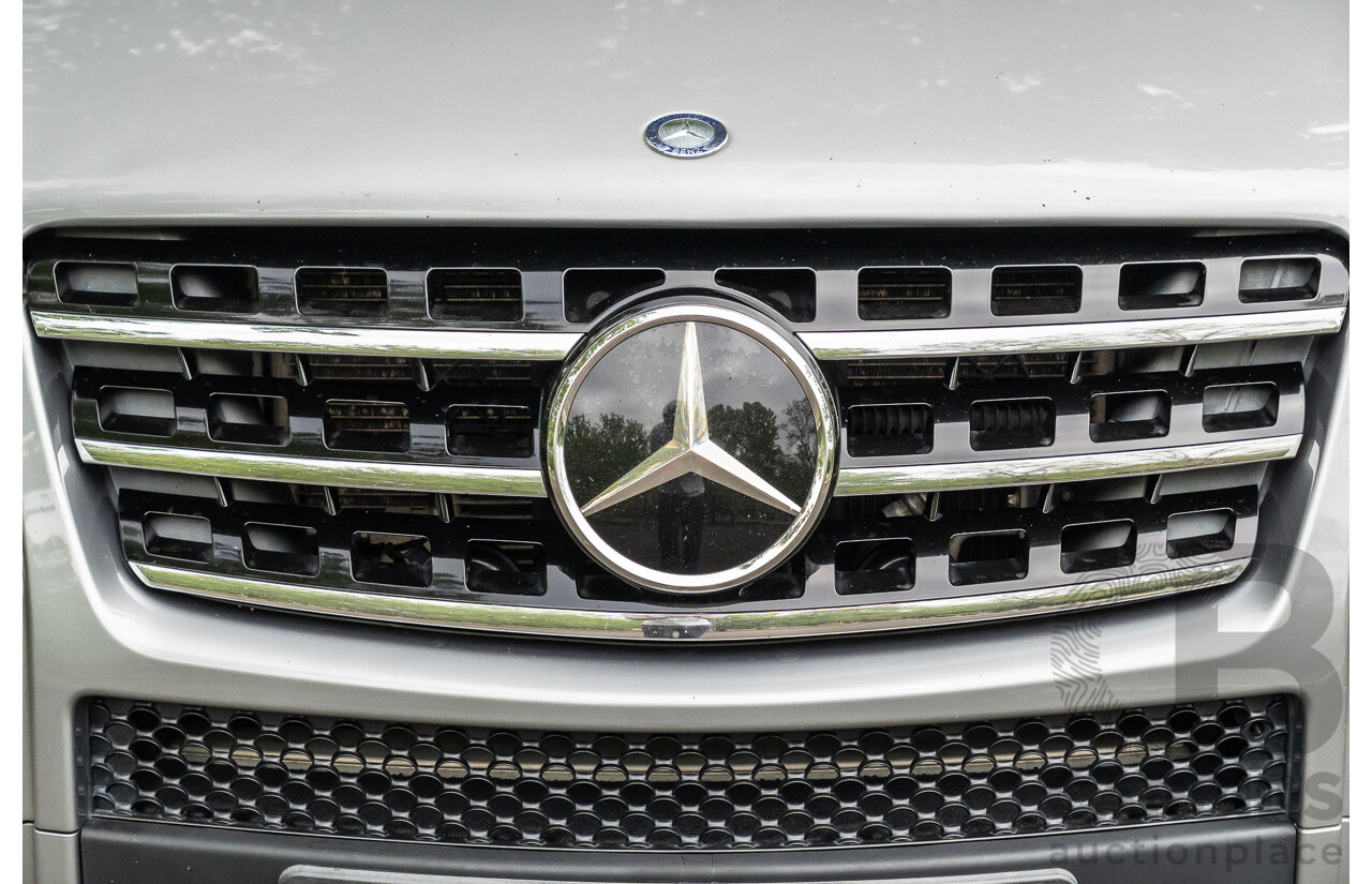 12/2009 Mercedes-Benz ML 63 AMG (4x4) W164 08 Upgrade 4d Wagon Palladium Silver Metallic V8 6.2L
