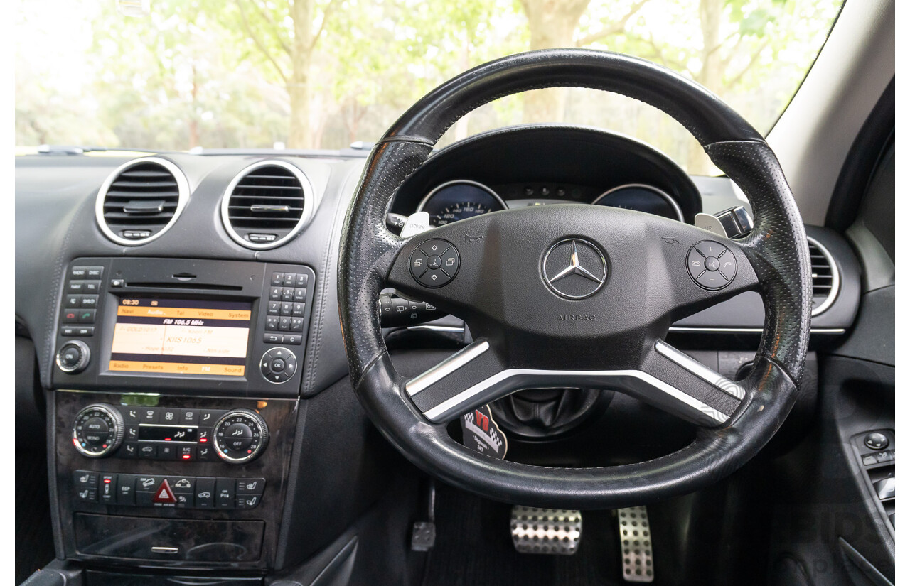 12/2009 Mercedes-Benz ML 63 AMG (4x4) W164 08 Upgrade 4d Wagon Palladium Silver Metallic V8 6.2L