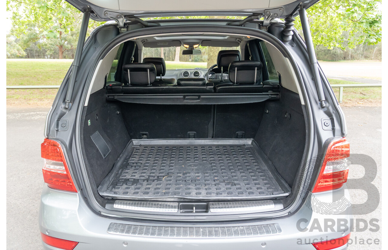12/2009 Mercedes-Benz ML 63 AMG (4x4) W164 08 Upgrade 4d Wagon Palladium Silver Metallic V8 6.2L