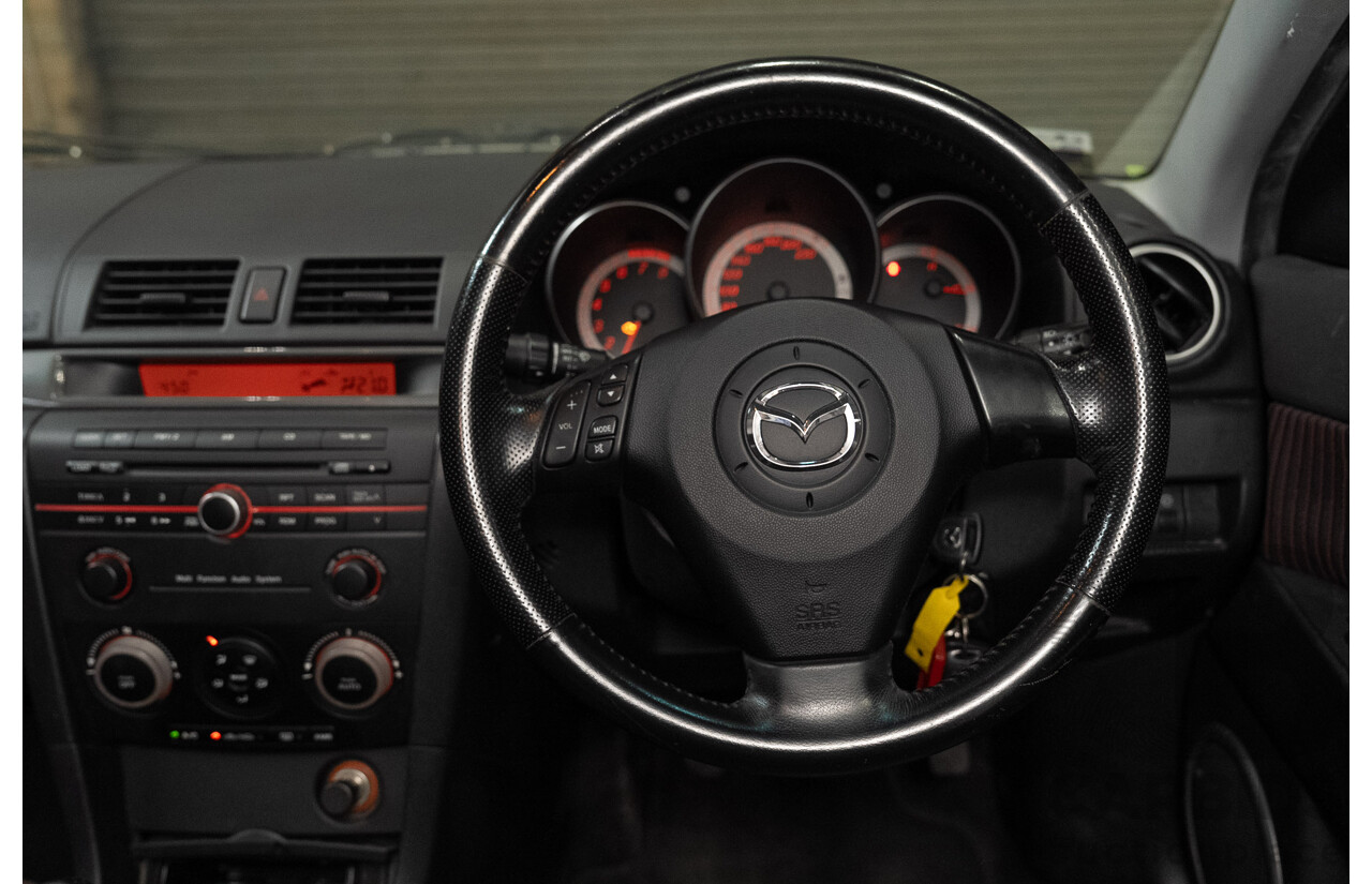 01/2004 Mazda 3 SP23 BK 4d Sedan Sunlight Silver Metallic 2.3L