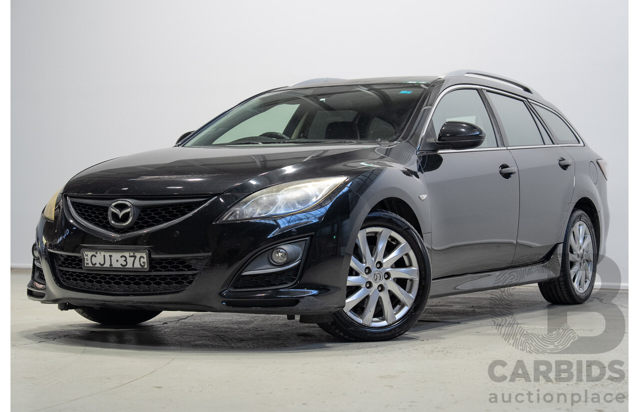 09/2012 Mazda Touring GH MY11 4d Wagon Black 2.5L