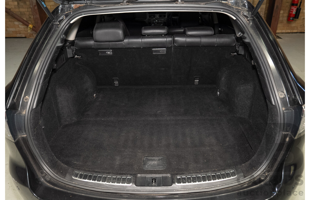 09/2012 Mazda Touring GH MY11 4d Wagon Black 2.5L