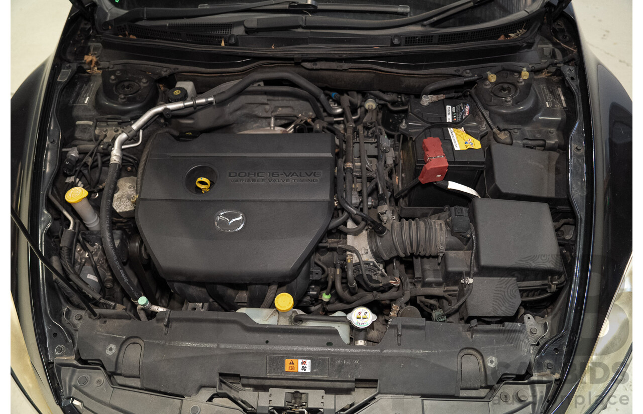 09/2012 Mazda Touring GH MY11 4d Wagon Black 2.5L