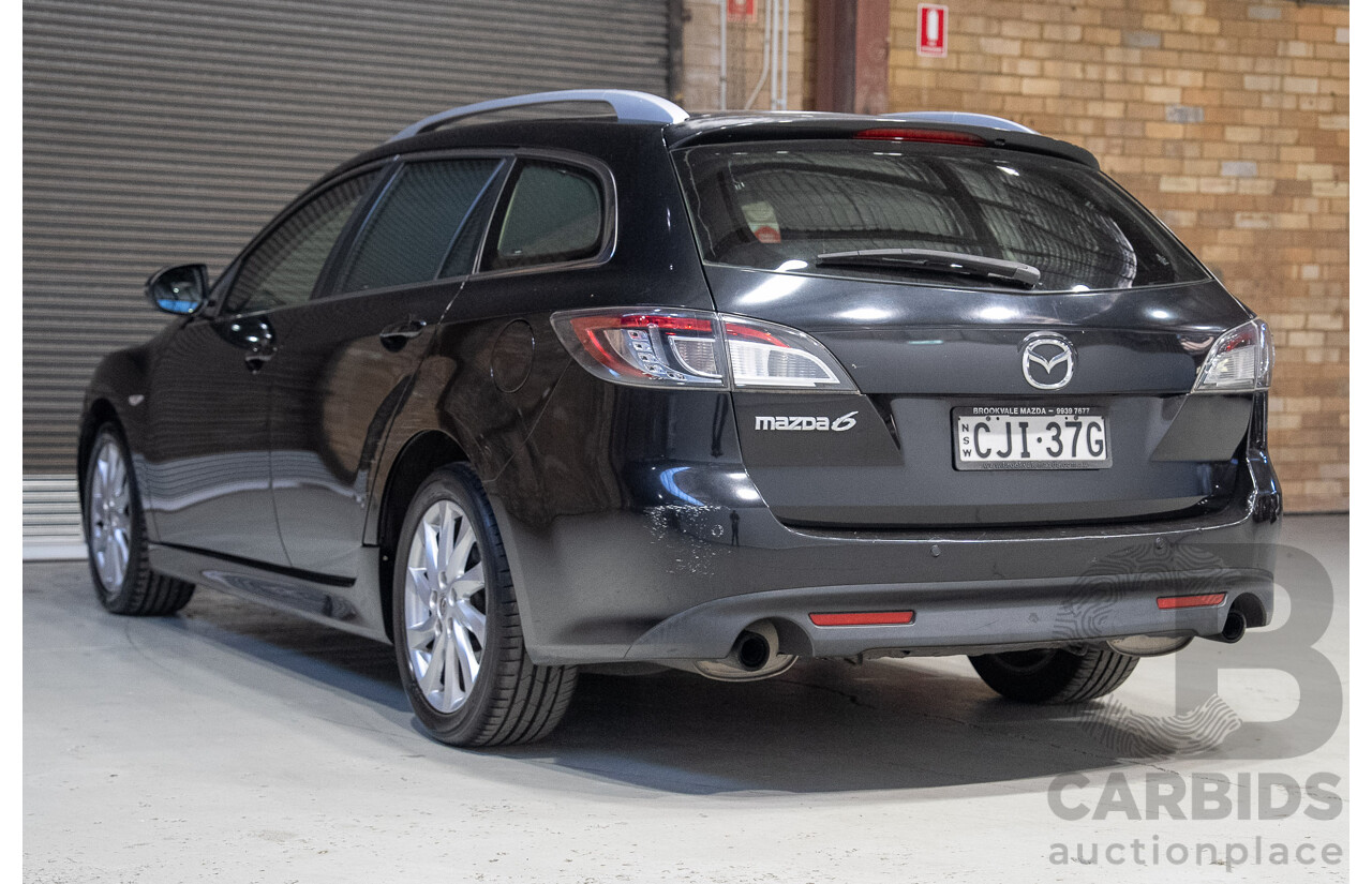 09/2012 Mazda Touring GH MY11 4d Wagon Black 2.5L