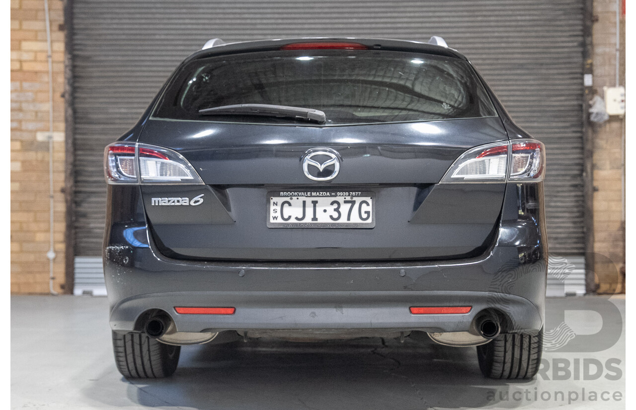 09/2012 Mazda Touring GH MY11 4d Wagon Black 2.5L