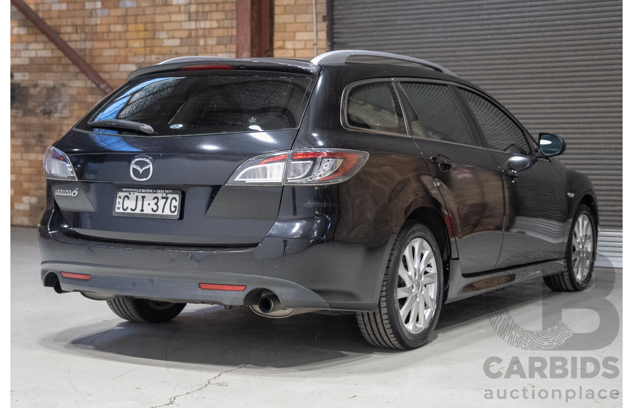 09/2012 Mazda Touring GH MY11 4d Wagon Black 2.5L