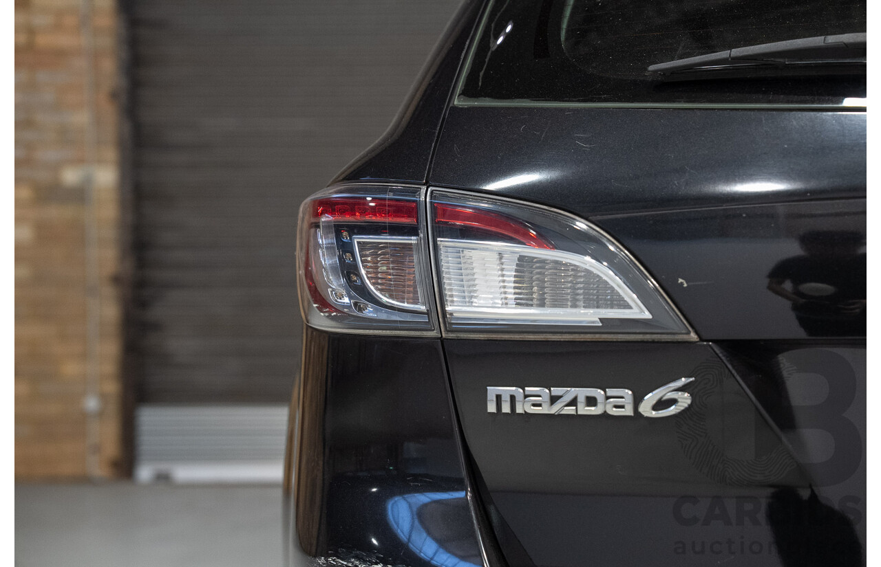 09/2012 Mazda Touring GH MY11 4d Wagon Black 2.5L