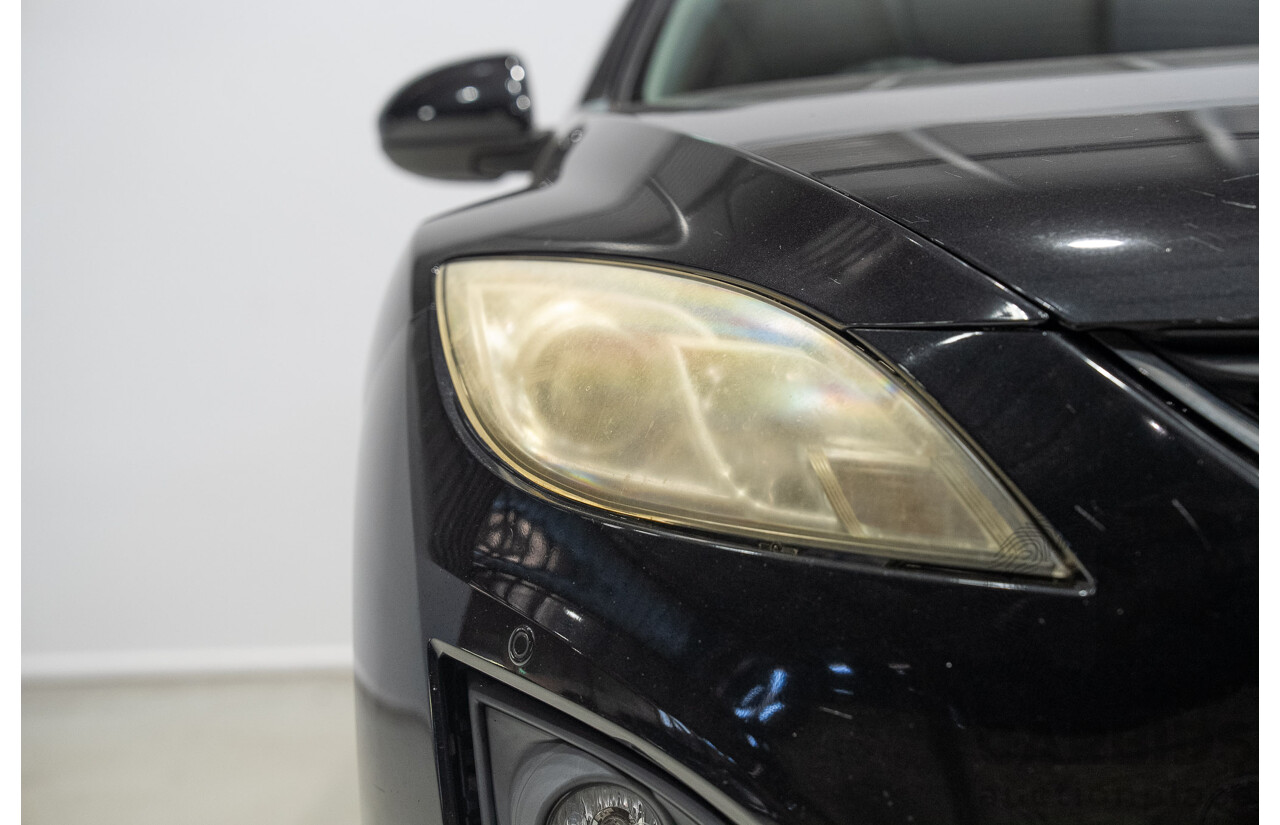 09/2012 Mazda Touring GH MY11 4d Wagon Black 2.5L