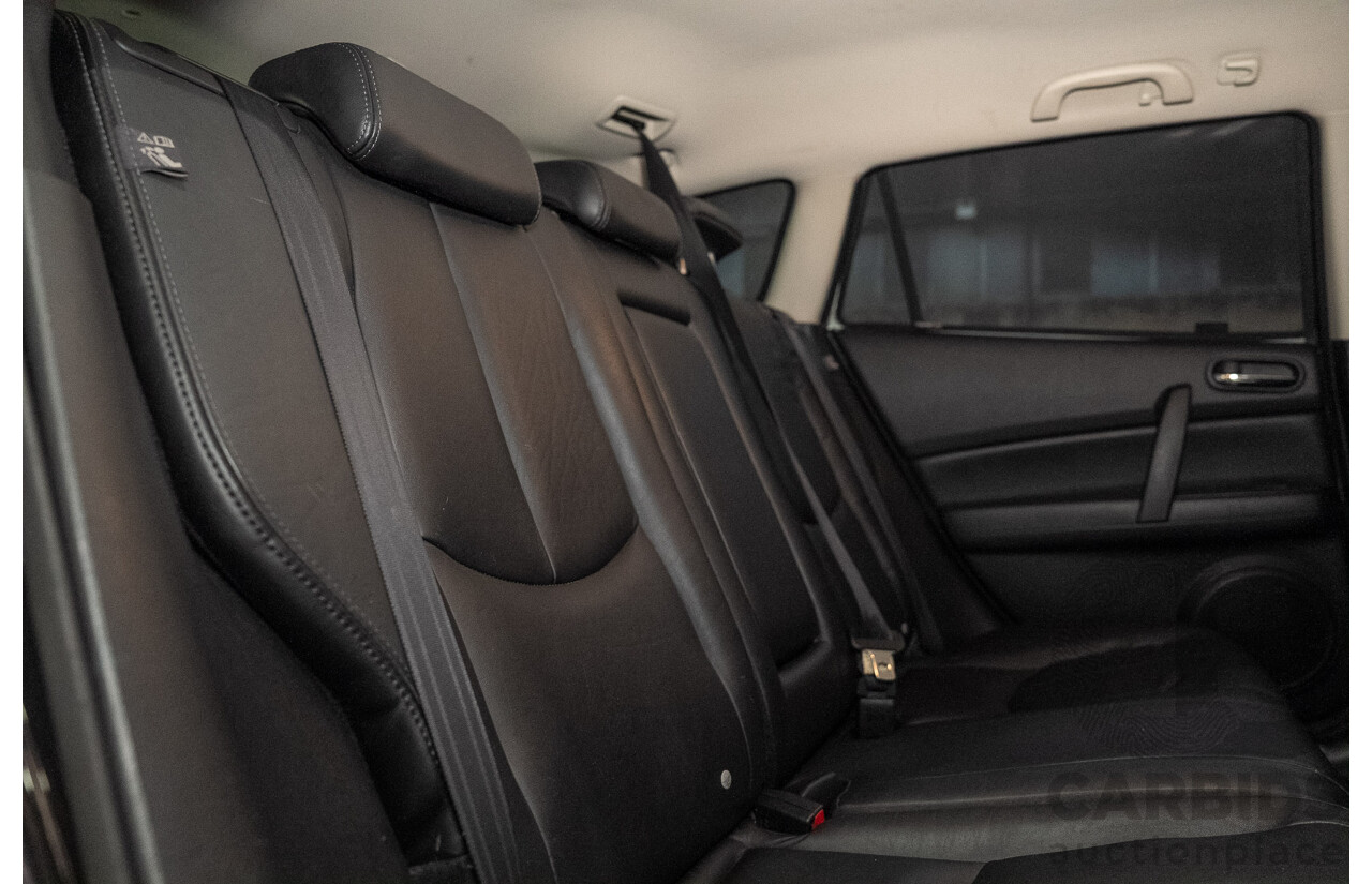 09/2012 Mazda Touring GH MY11 4d Wagon Black 2.5L