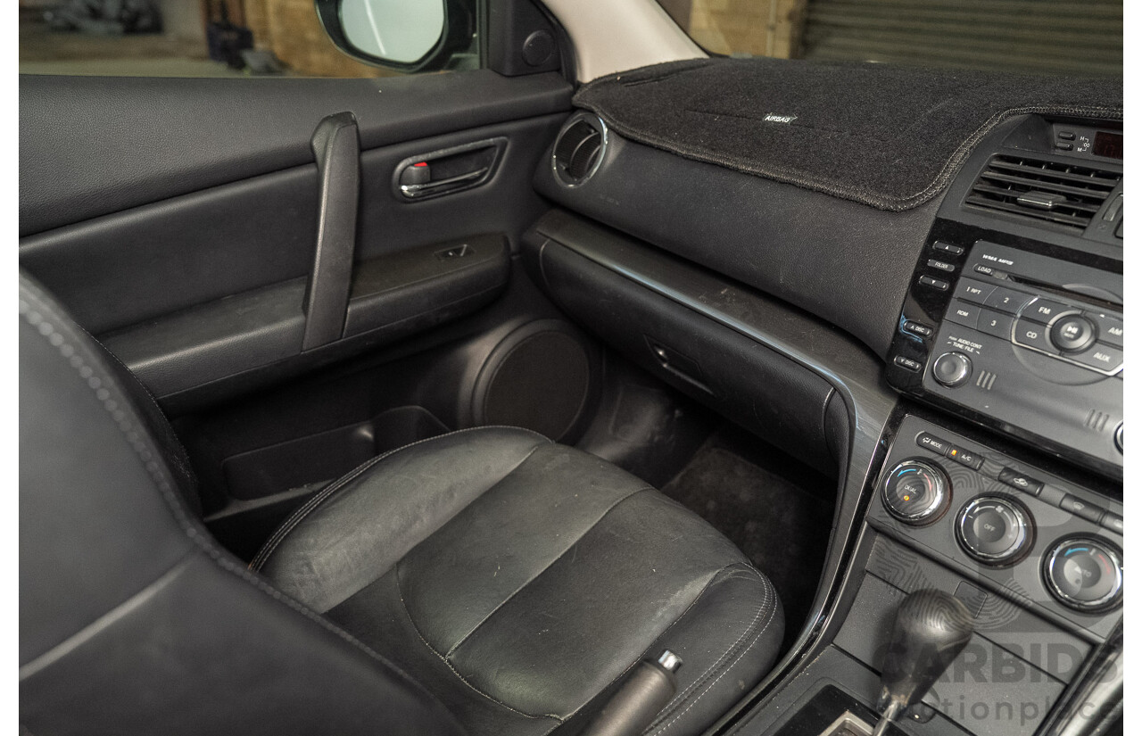 09/2012 Mazda Touring GH MY11 4d Wagon Black 2.5L