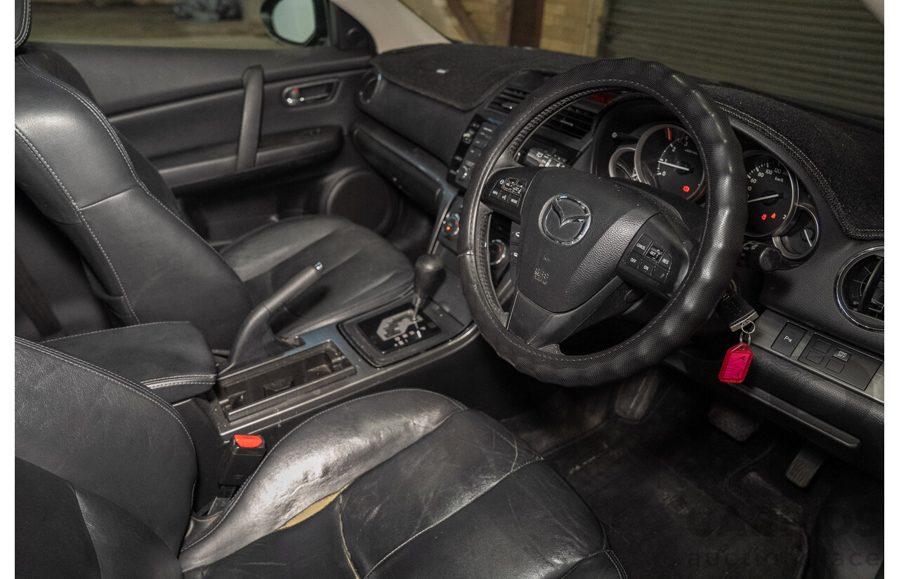 09/2012 Mazda Touring GH MY11 4d Wagon Black 2.5L