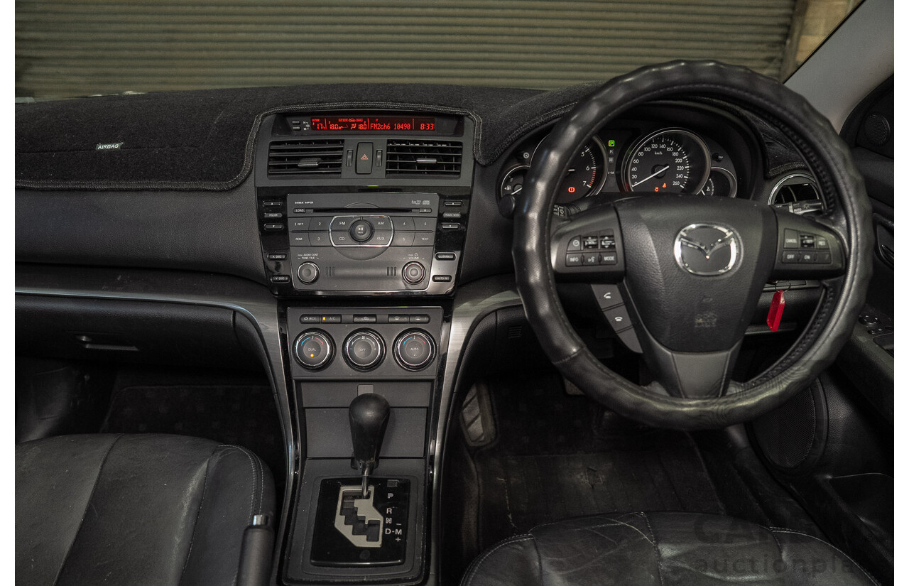 09/2012 Mazda Touring GH MY11 4d Wagon Black 2.5L