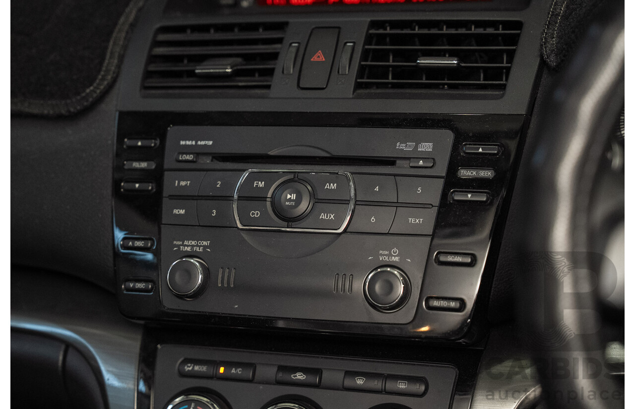 09/2012 Mazda Touring GH MY11 4d Wagon Black 2.5L