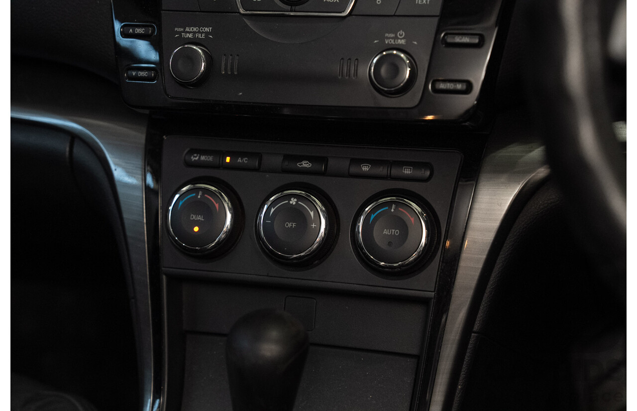 09/2012 Mazda Touring GH MY11 4d Wagon Black 2.5L