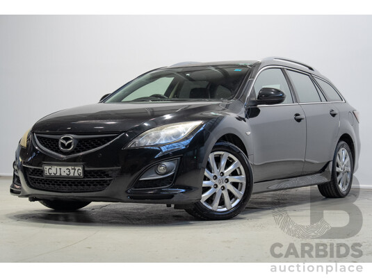 09/2012 Mazda Touring GH MY11 4d Wagon Black 2.5L