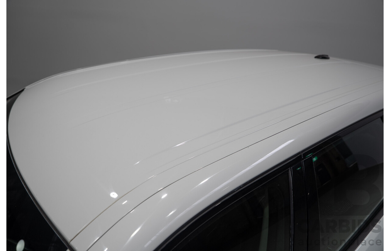 06/2015 Land Rover Discovery Sport SD4 SE (AWD) LC 4d Wagon Fuji White Turbo Diesel 2.2L - 7 Seater