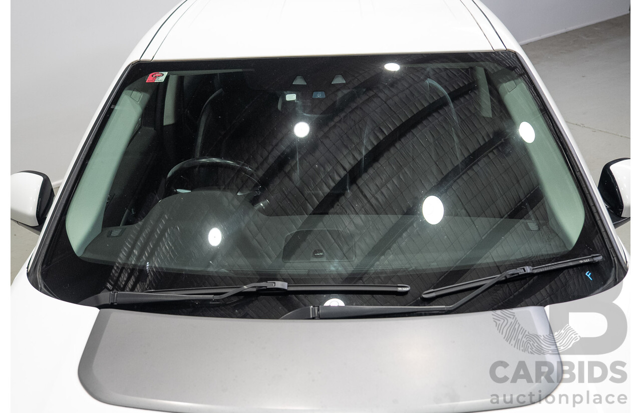 06/2015 Land Rover Discovery Sport SD4 SE (AWD) LC 4d Wagon Fuji White Turbo Diesel 2.2L - 7 Seater