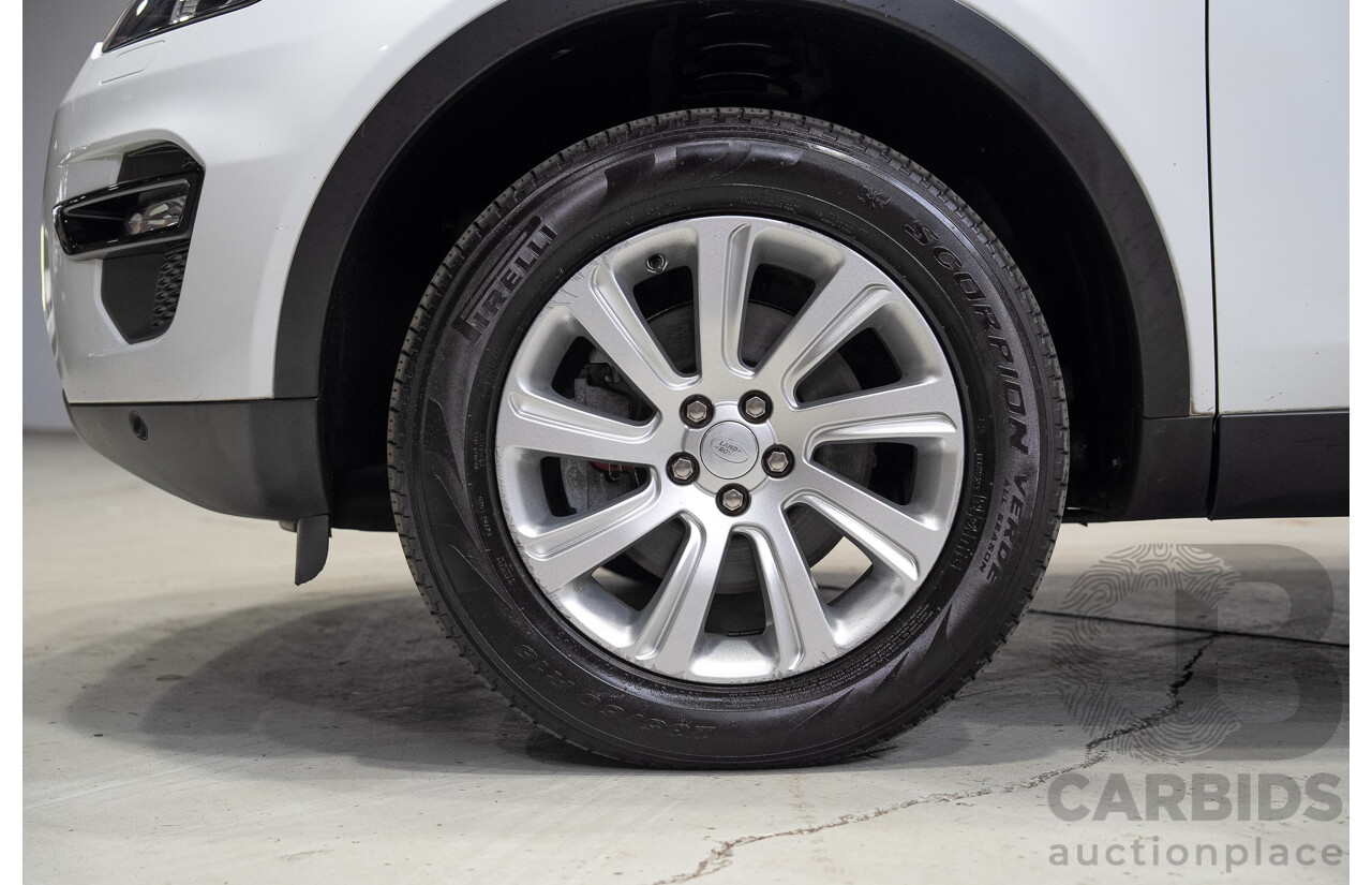 06/2015 Land Rover Discovery Sport SD4 SE (AWD) LC 4d Wagon Fuji White Turbo Diesel 2.2L - 7 Seater