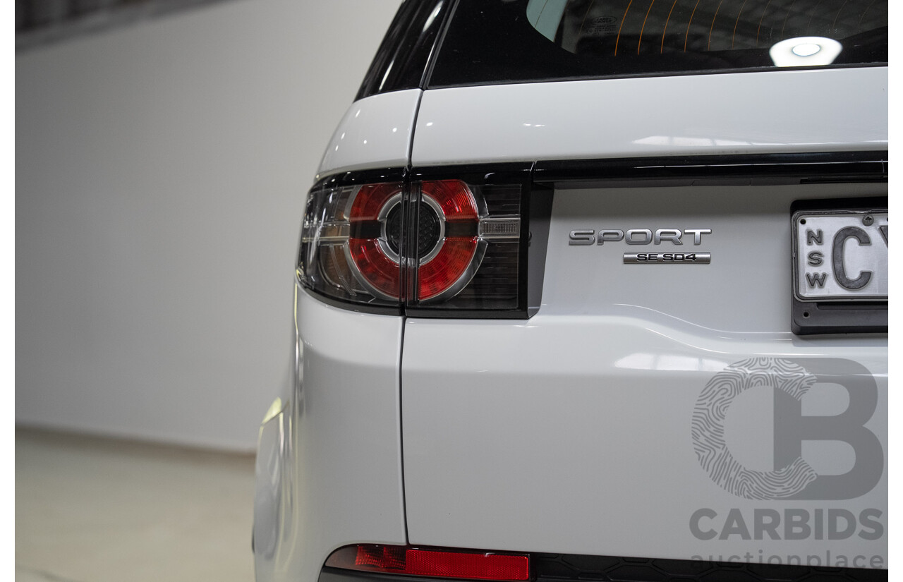 06/2015 Land Rover Discovery Sport SD4 SE (AWD) LC 4d Wagon Fuji White Turbo Diesel 2.2L - 7 Seater