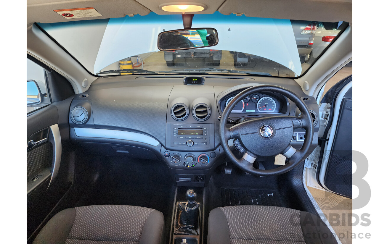 10/2011 Holden Barina  TK MY11 5d Hatchback White 1.6L