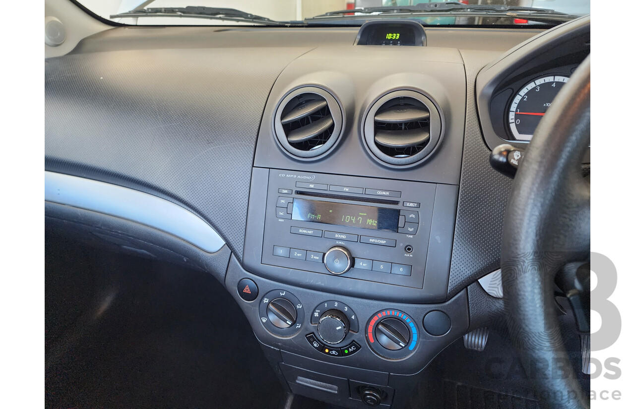 10/2011 Holden Barina  TK MY11 5d Hatchback White 1.6L