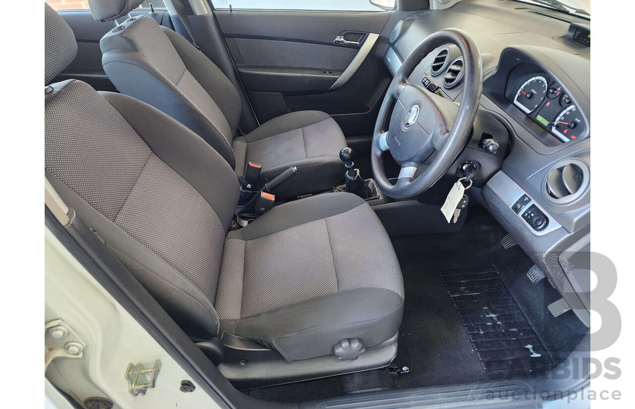 10/2011 Holden Barina  TK MY11 5d Hatchback White 1.6L