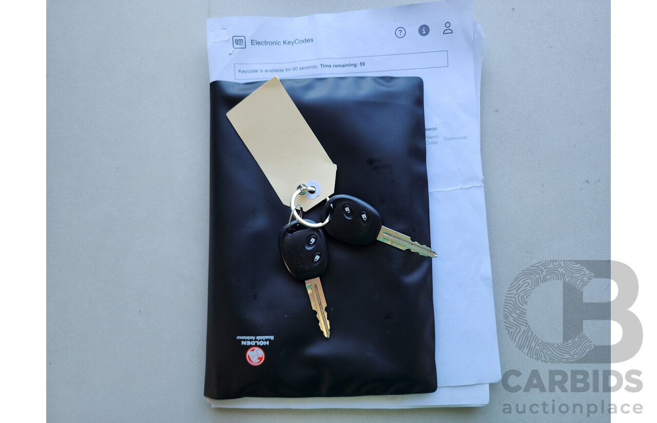 10/2011 Holden Barina  TK MY11 5d Hatchback White 1.6L