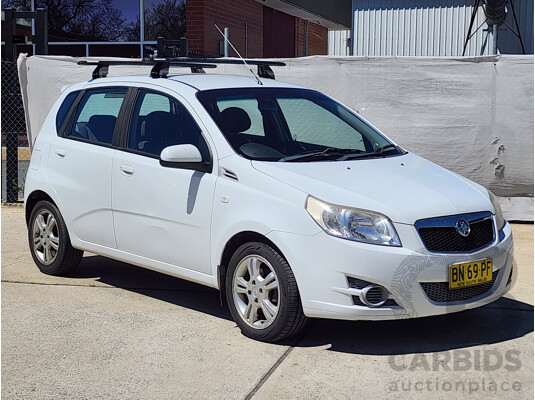 10/2011 Holden Barina  TK MY11 5d Hatchback White 1.6L