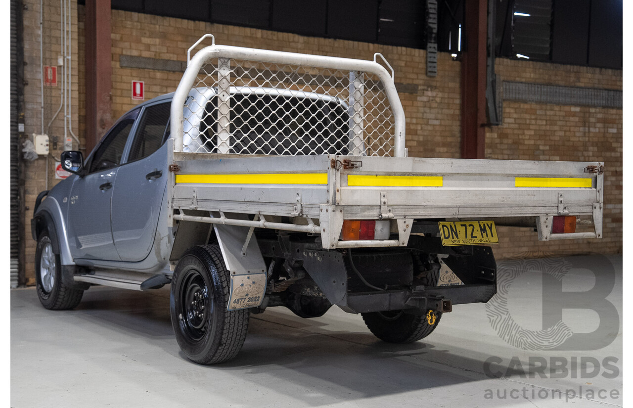 12/2009 Mitsubishi Triton GL-R (4x4) MN MY10 Double Cab Utility SIlver Turbo Diesel 2.5L