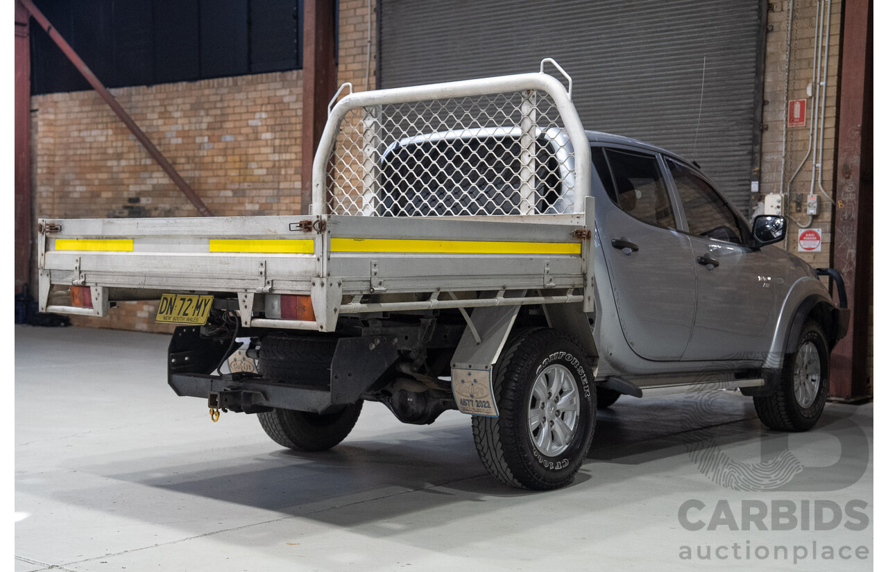 12/2009 Mitsubishi Triton GL-R (4x4) MN MY10 Double Cab Utility SIlver Turbo Diesel 2.5L