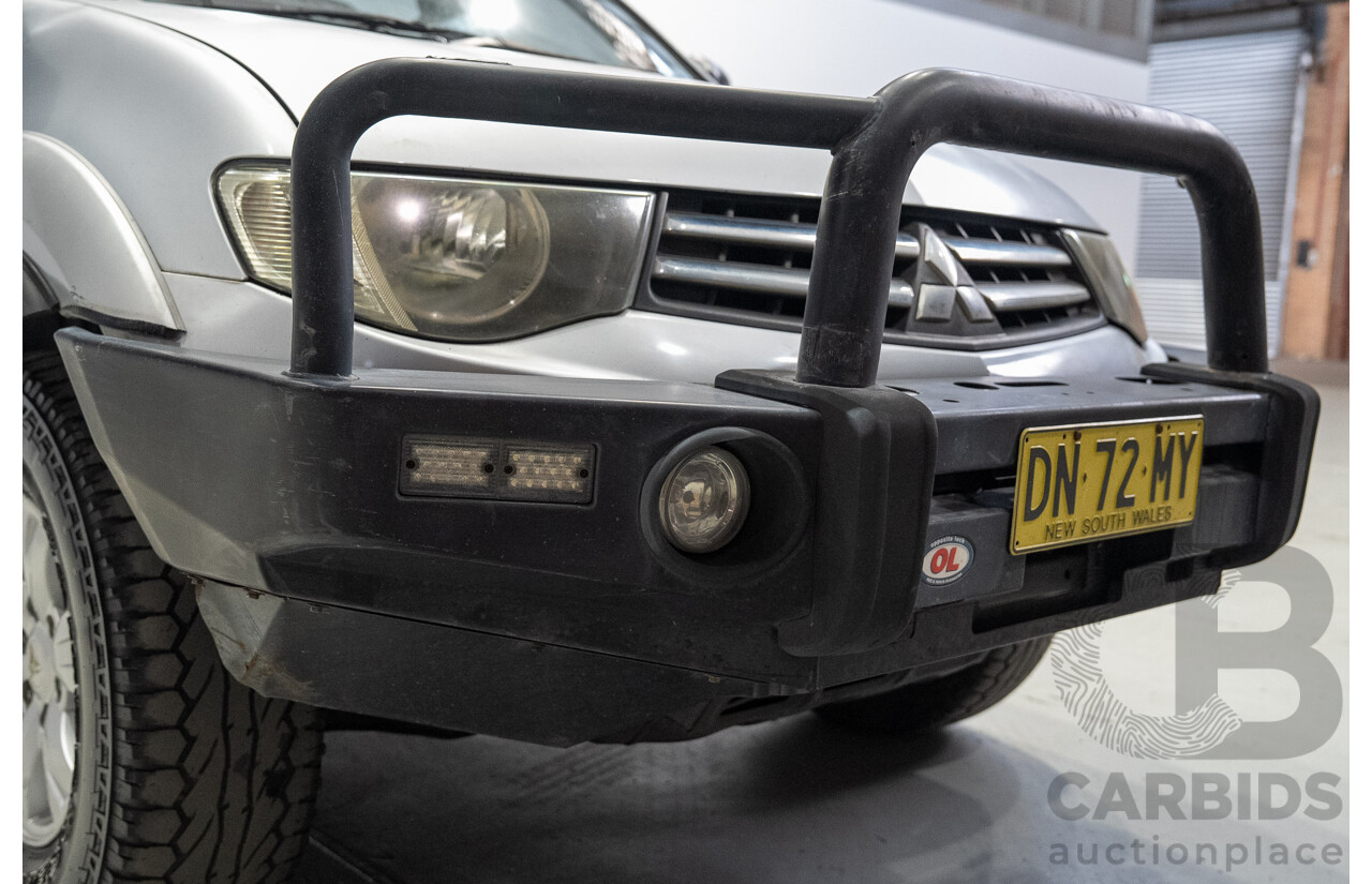 12/2009 Mitsubishi Triton GL-R (4x4) MN MY10 Double Cab Utility SIlver Turbo Diesel 2.5L