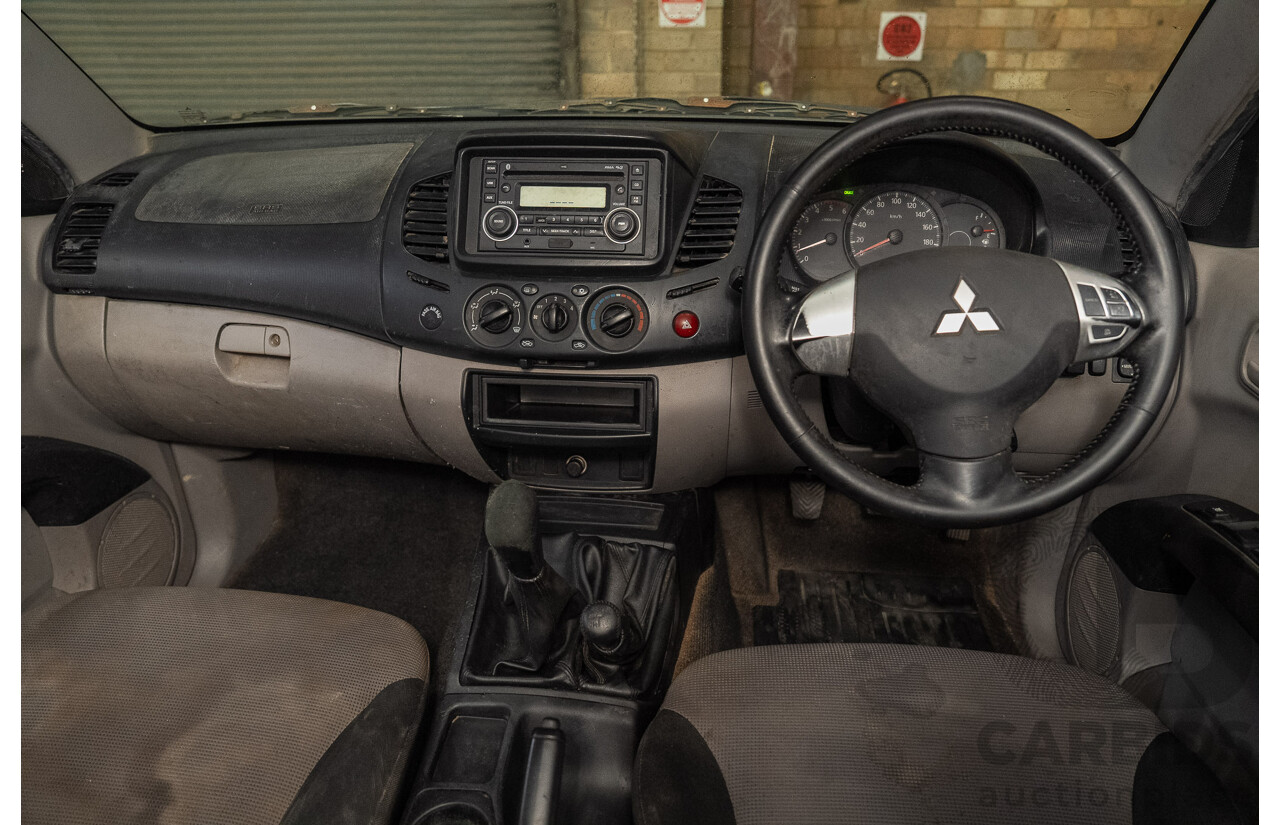 12/2009 Mitsubishi Triton GL-R (4x4) MN MY10 Double Cab Utility SIlver Turbo Diesel 2.5L