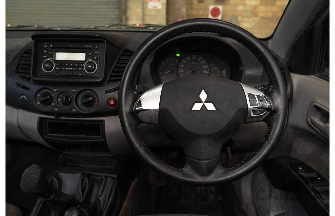 12/2009 Mitsubishi Triton GL-R (4x4) MN MY10 Double Cab Utility SIlver Turbo Diesel 2.5L